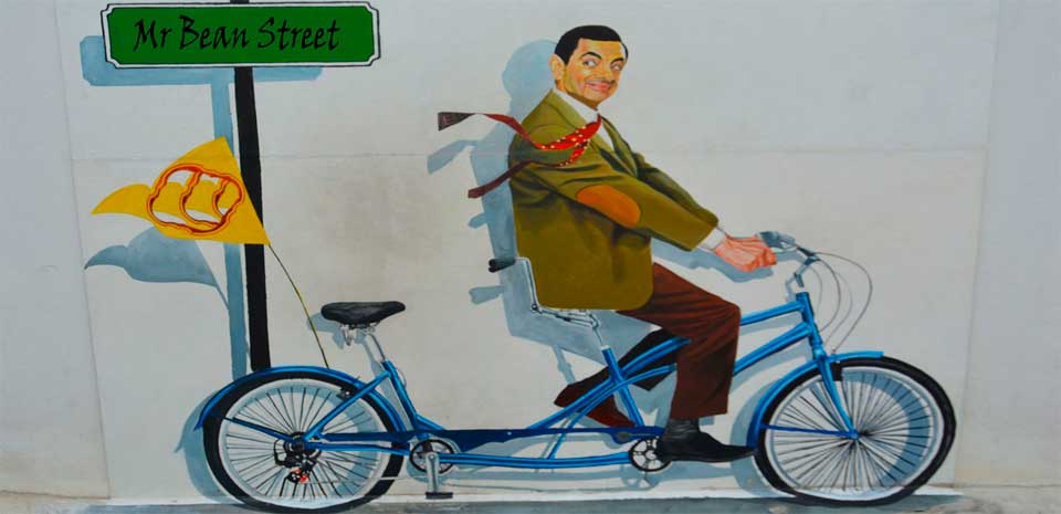 Глупость, рисованный мистер Бин на велосипеде